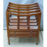 A mahogany Canterbury / magazine rack with two drawers raised on castors, W47 x H58 x D36cm