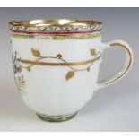 An 18thC Worcester first period coffee can with hand painted flower decoration, H6.3cm