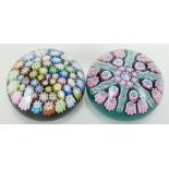 Two Peter McDougal glass millefiori paperweights one with latticinio tubes, each 45mm in diameter,