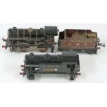 Hornby 0 gauge clockwork locomotive 8712 together with an LNER 5007 body and and LMS tender.