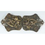 Art Nouveau gilt metal belt buckle decorated with lilies, width 11.5cm