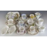 A quantity of mainly Shelley tea ware including Art Deco jug, English Lakes & Blue Iris patterns,