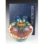 Moorcroft vase decorated in the Anna Lily pattern, H8.5cm, with box