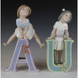 Two Lladro figures 'A' and 'U'