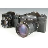 Two Praktica SLR cameras comprising EE3 with 135mm 1:2.8 lens and and LLC with Meyer 50mm 1:1.8