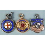 9ct gold and hallmarked silver football fobs including Gloucestershire Football Association Northern