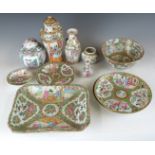 A 19th/20thC collection of Canton Chinese famille rose porcelain including plates, vases etc,