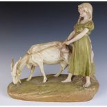 Royal Dux figure of a girl with goat, H28.5cm