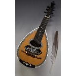 Unlabelled late 19thC 31 piece fluted and silvered bowl back six string Lombardi mandolin, the