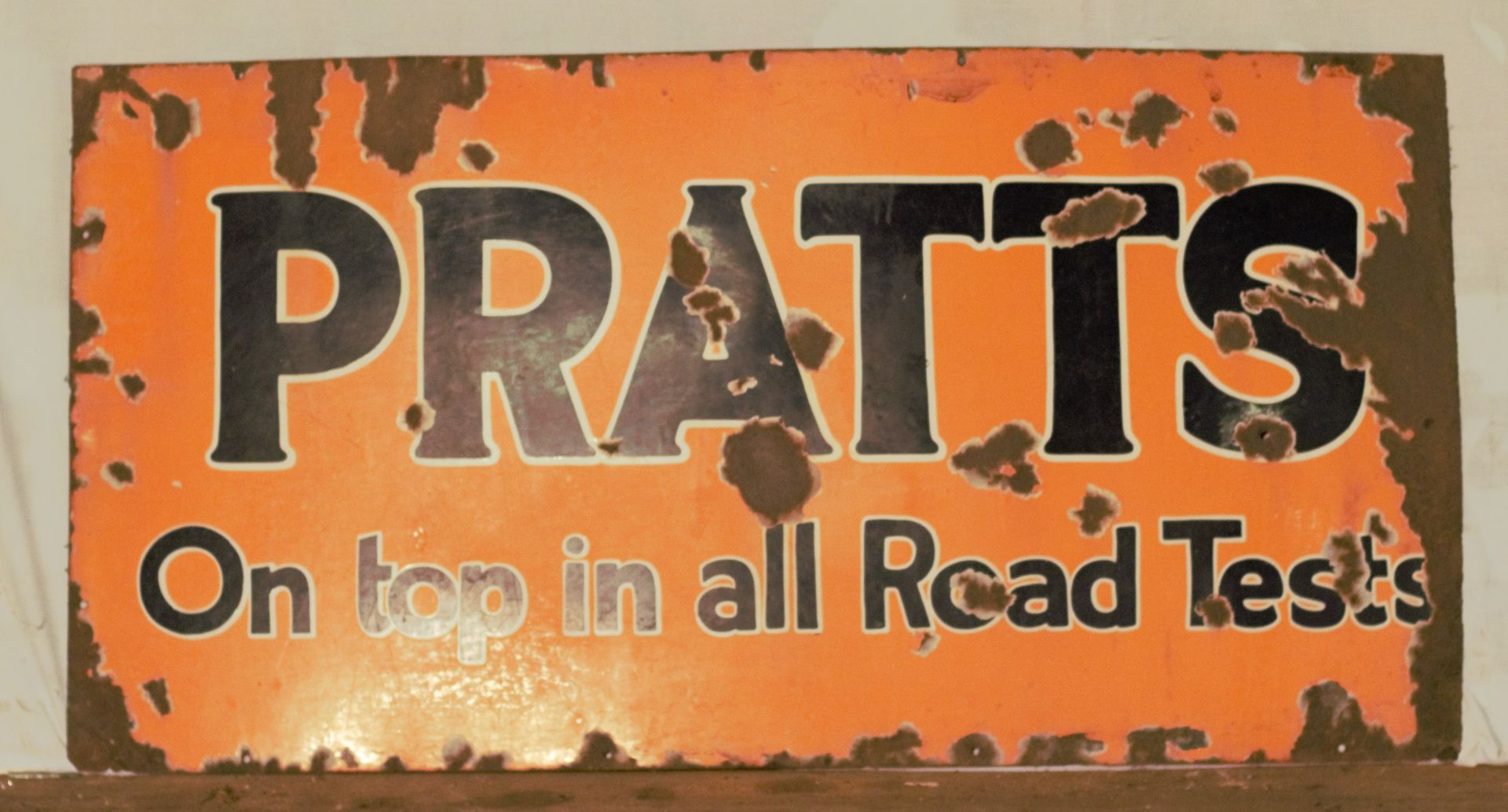 Vintage enamel advertising sign 'Pratt's', 61 x 118cm PLEASE NOTE this lot is located at and will be