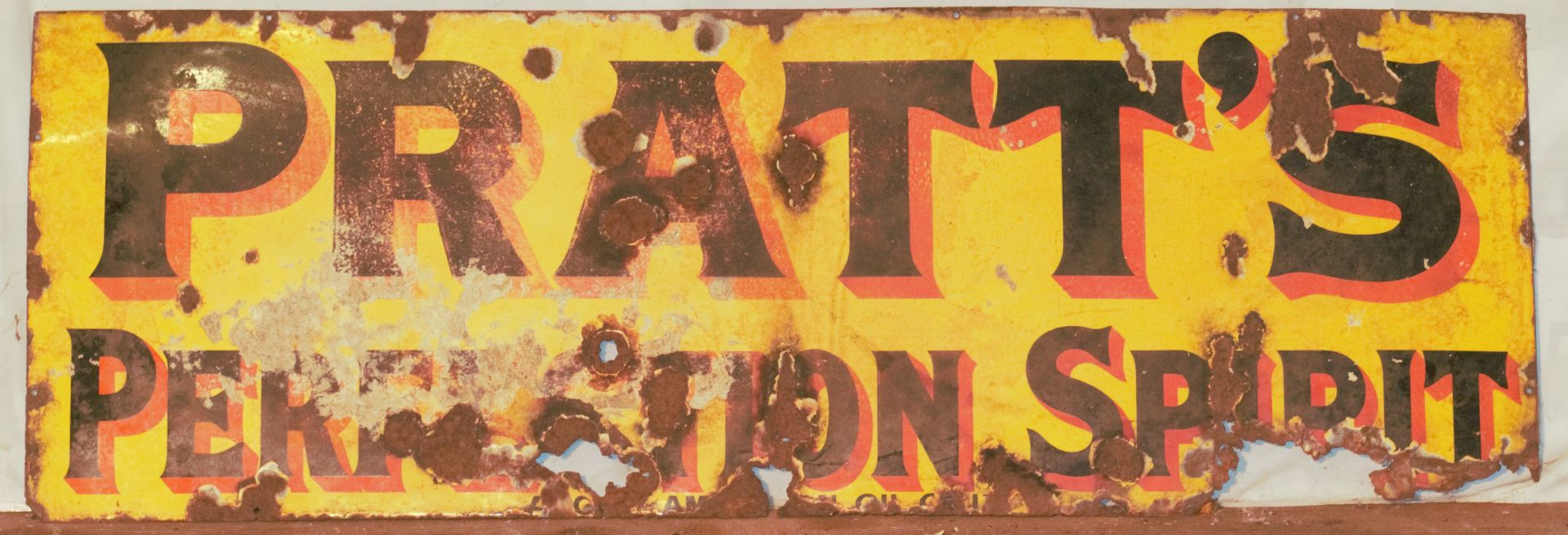 Vintage enamel advertising sign 'Pratt's Perfection Spirit', 46 x 133cm PLEASE NOTE this lot is