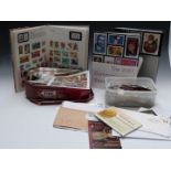 USA 2001 Commemorative Stamp Yearbook, two boxes of all-world stamps, covers etc, and a Strand stamp