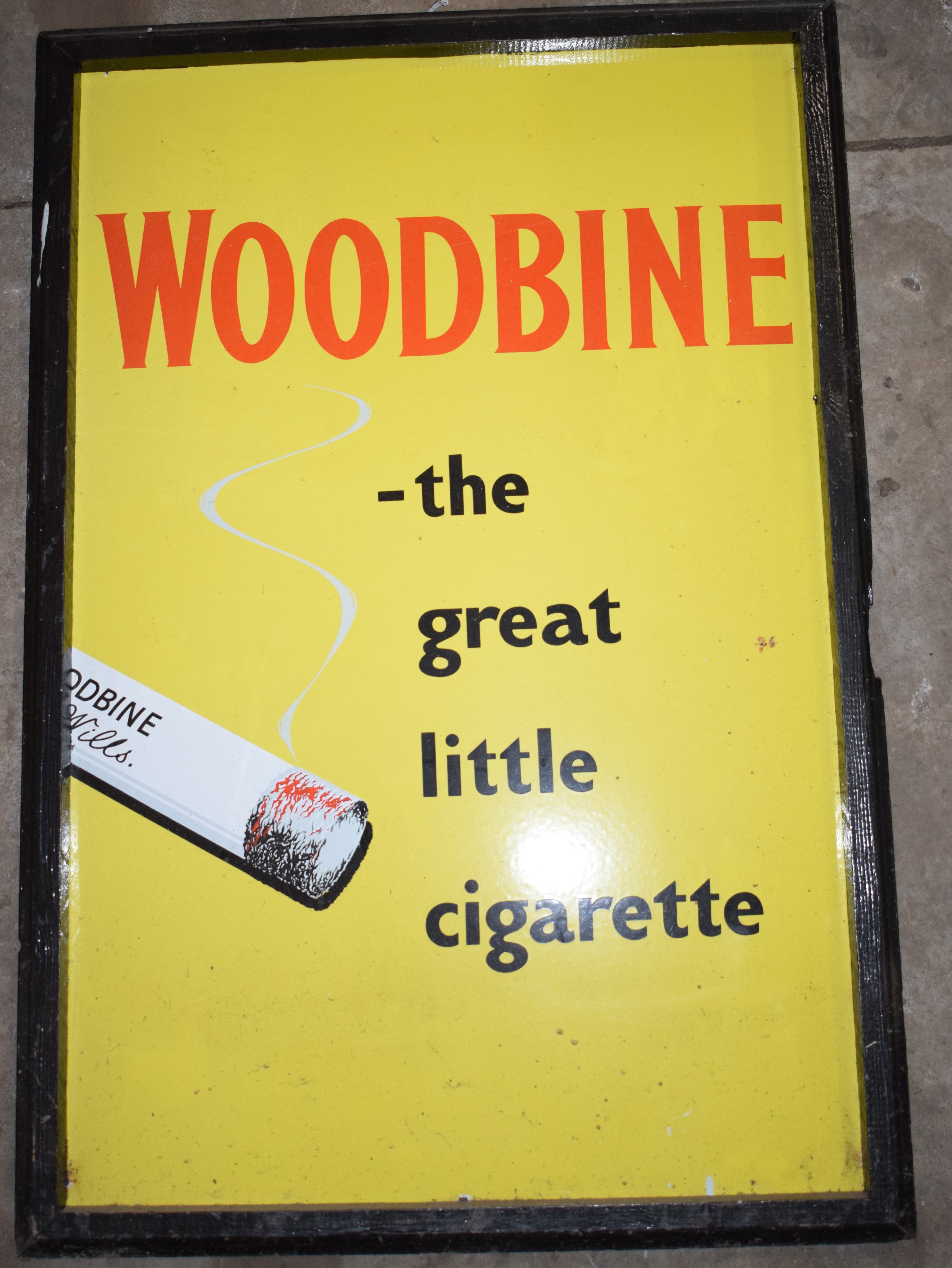 Vintage enamel advertising sign 'Woodbine Cigarettes', in frame  PLEASE NOTE this lot is located