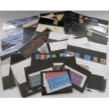 Approximately 60 GB definitive stamp presentation packs and sundry other definitive stamps, face