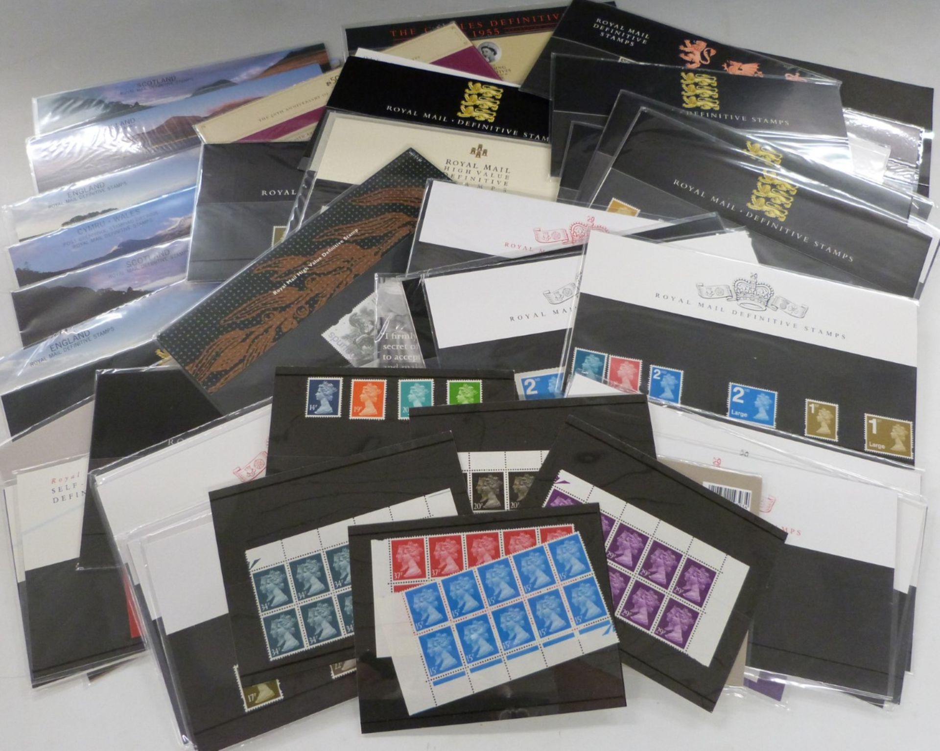Approximately 60 GB definitive stamp presentation packs and sundry other definitive stamps, face