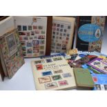 A quantity of all world stamps, loose and in albums, reference books etc