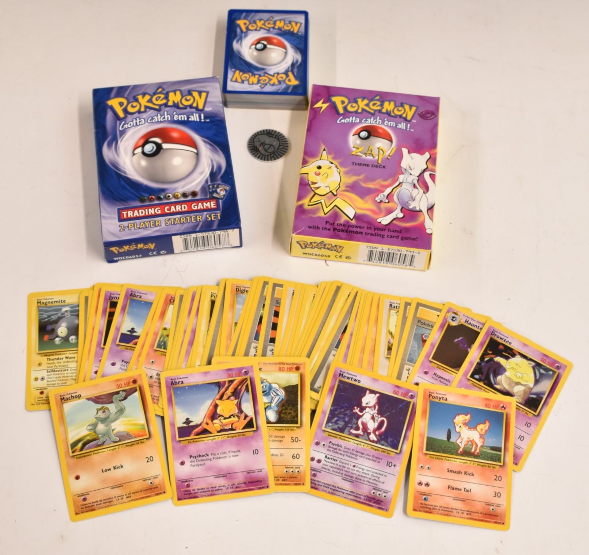 Two Wizards of the Coast 1999 Pokemon card sets, one Zap Theme the other 2-Player Starter Set with