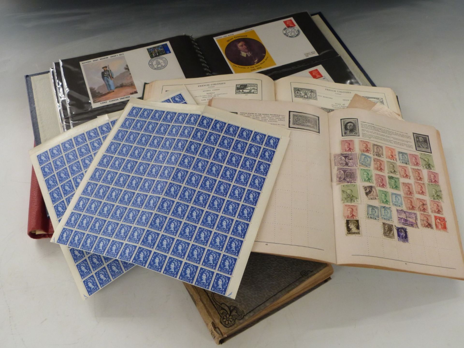 A collection of stamps in The Lincoln, Strand and other albums, Army Museum album of covers, mint