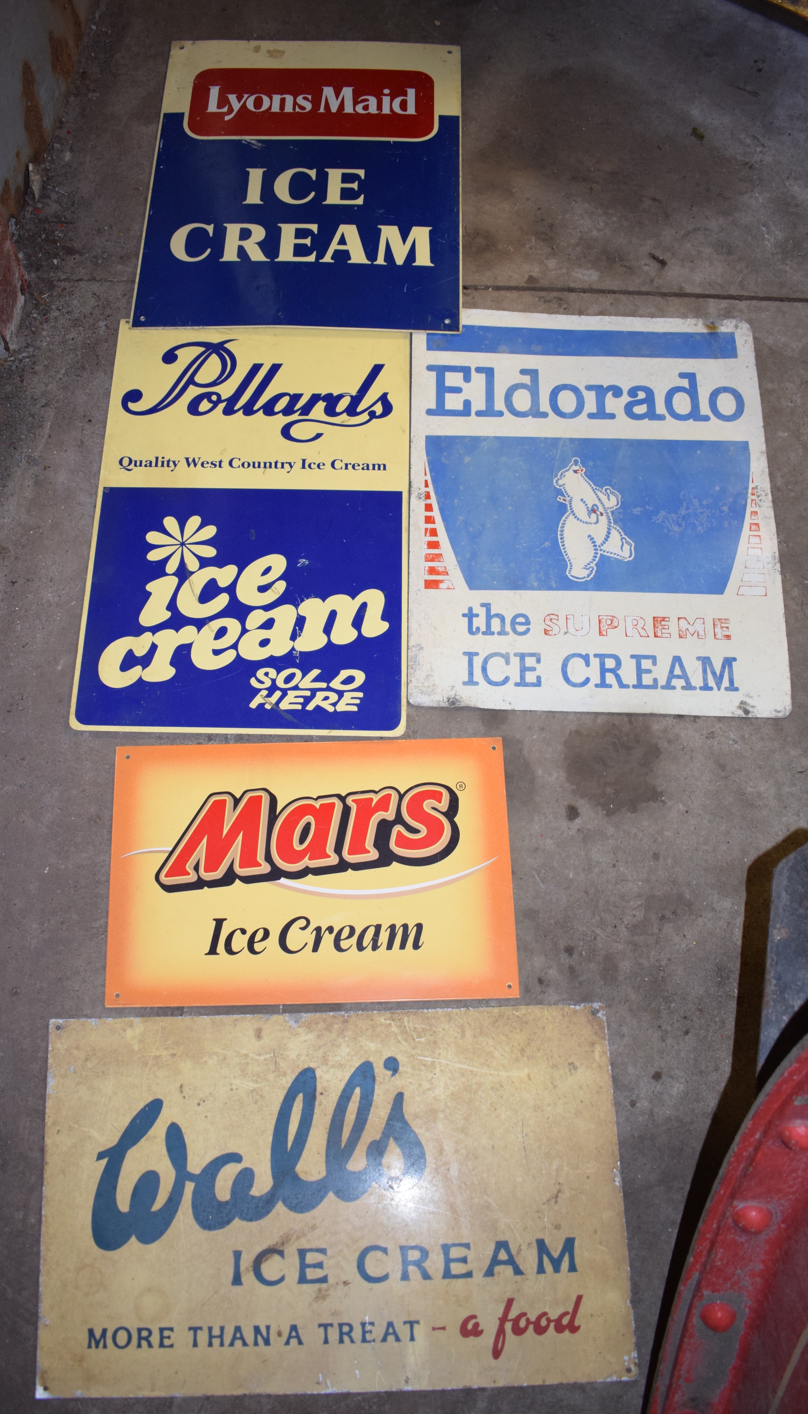 Five vintage ice cream advertising signs comprising Lyons Maid, Wall's, Pollards, Eldorado & Mars,