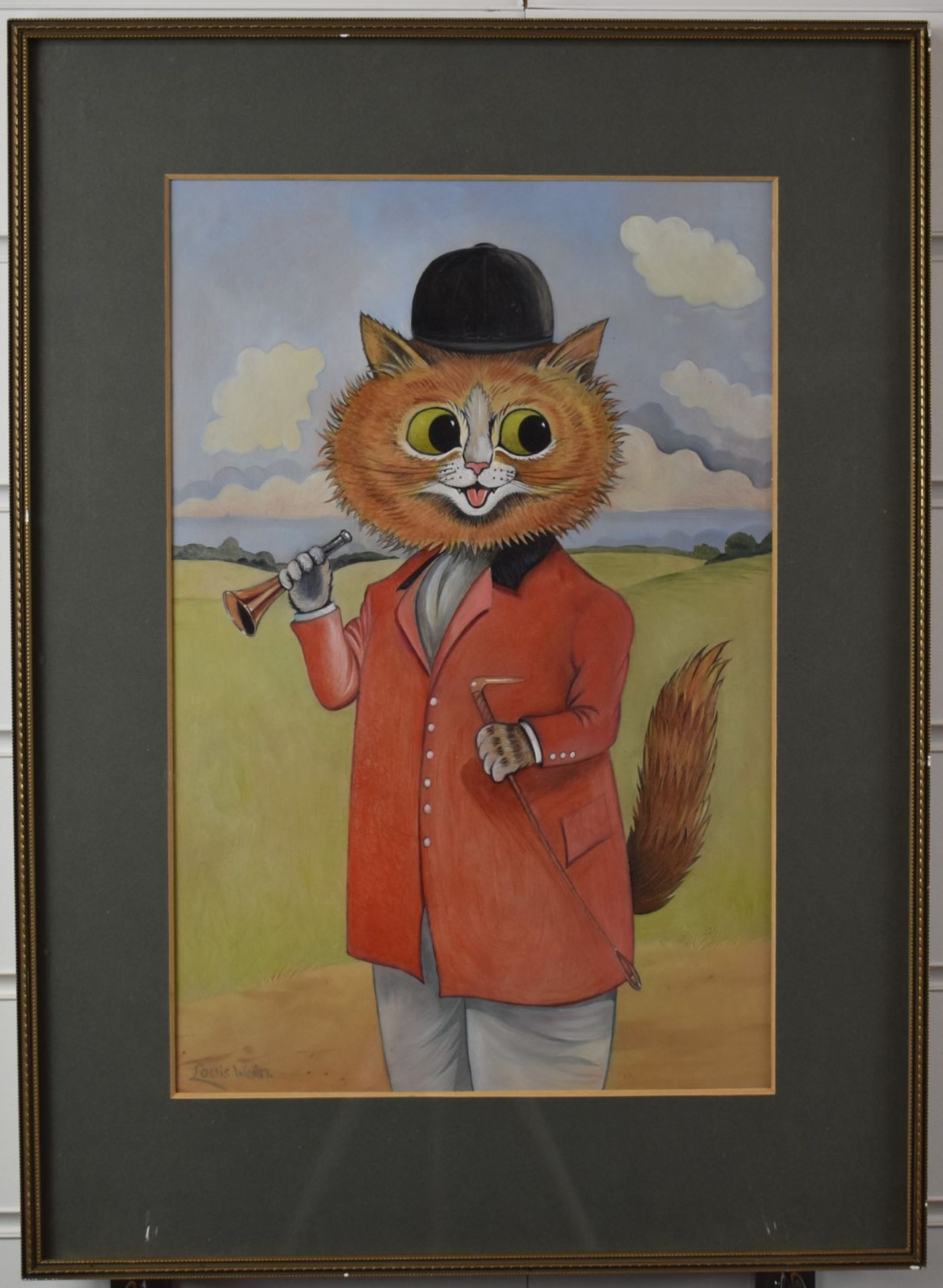 In the manner of Louis Wain novelty portrait of a cat dressed ready to go riding, with crop and horn - Image 2 of 4
