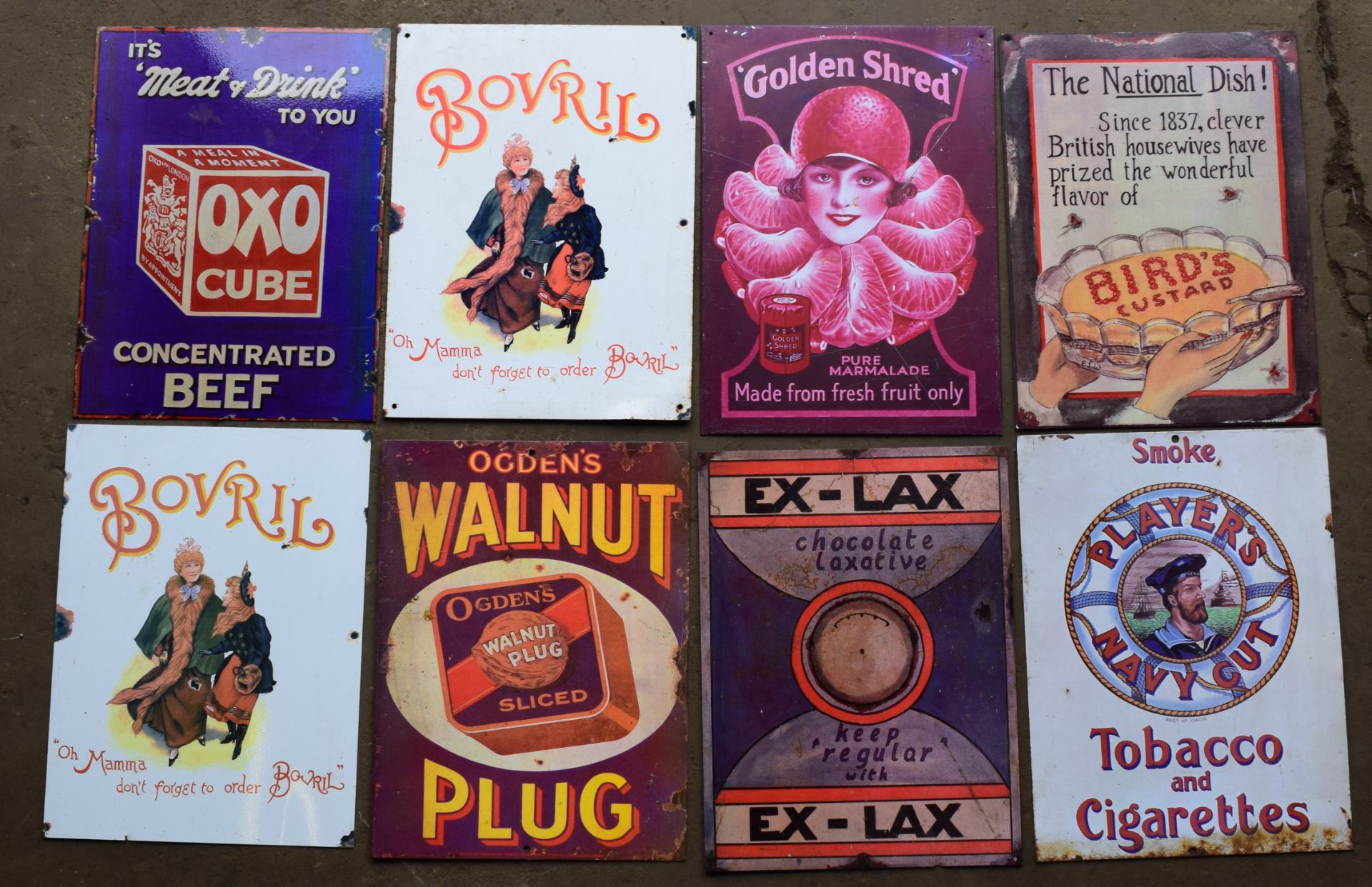 Eight metal advertising signs to include Golden Shred, Bird's custard, Bovril, Oxo etc, each