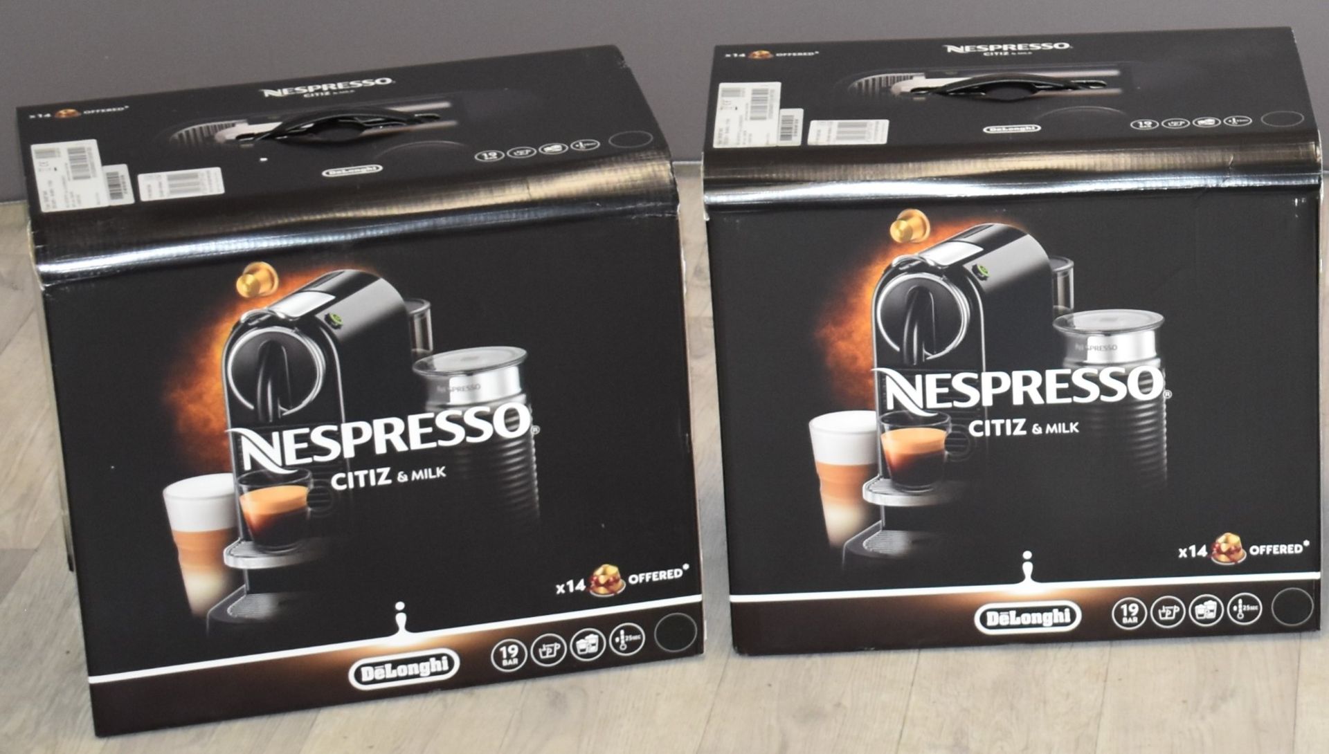 Two Nespresso coffee machines, new in boxes