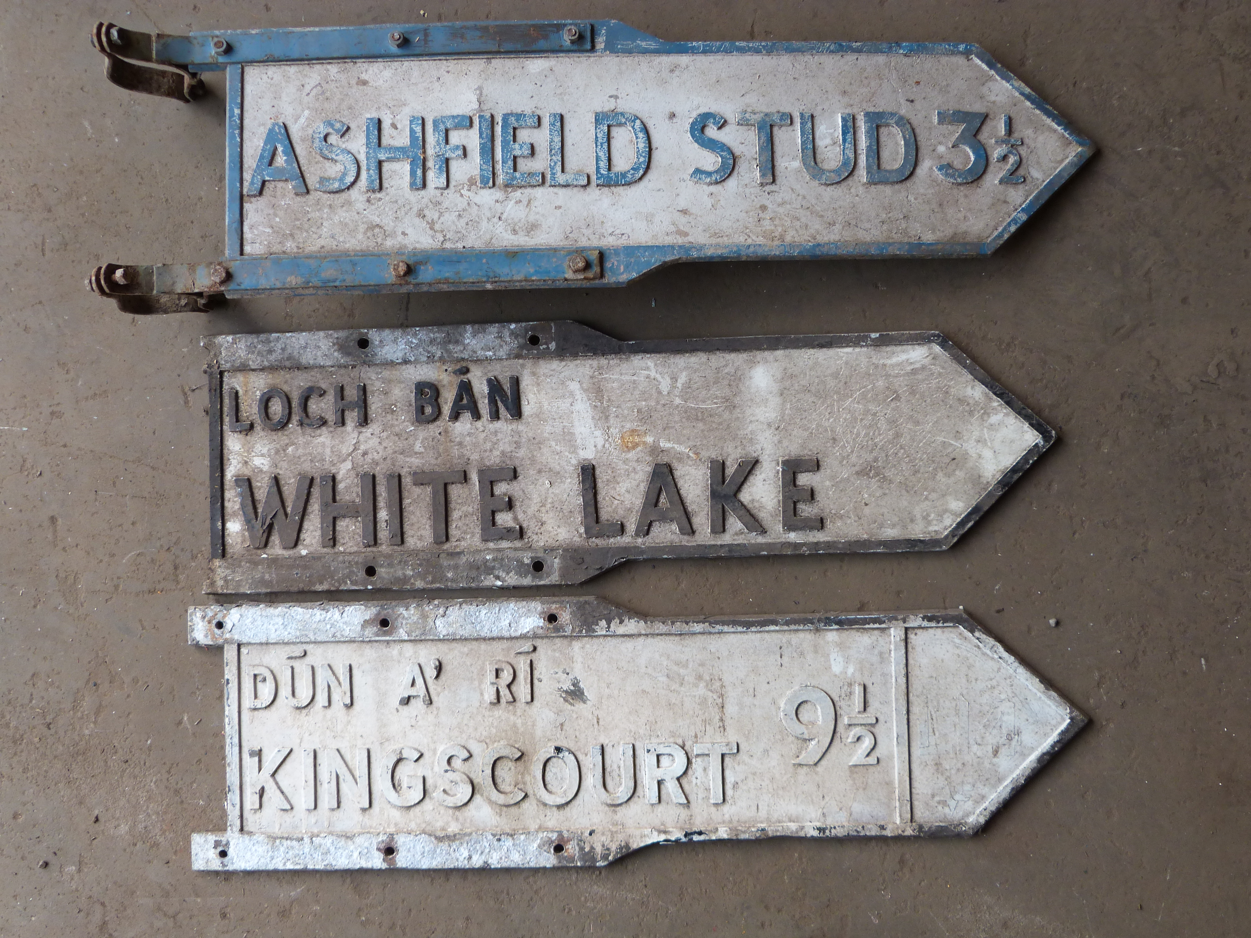 Three vintage Irish double sided cast aluminium road signs comprising Loch Ban White Lake,