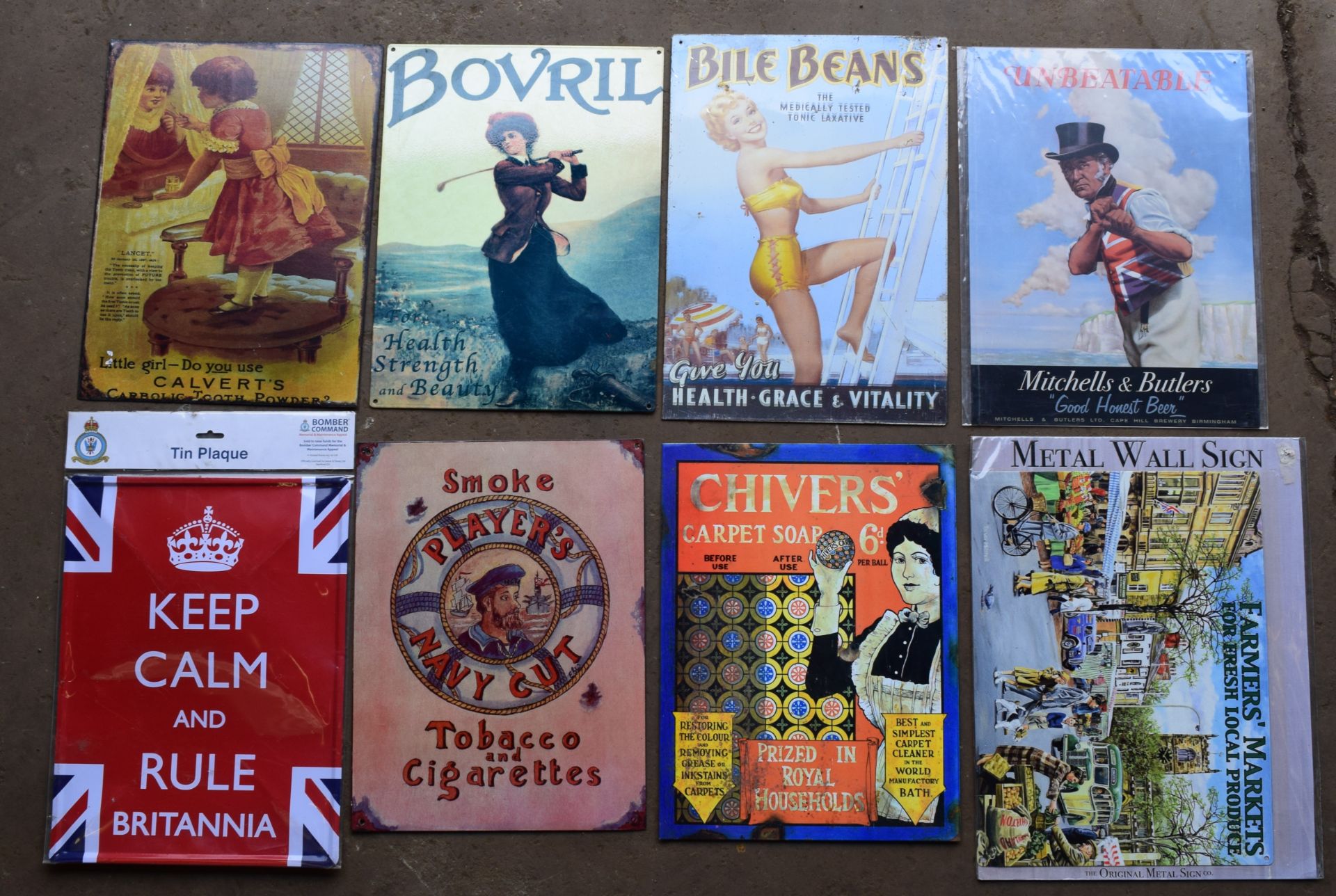 Eight metal advertising signs to include Farmers Markets, Bovril, Players etc, each approximately 40