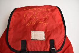 Hard Rock Café rucksack and Roger Waters rucksack, together with five tour baseball caps including