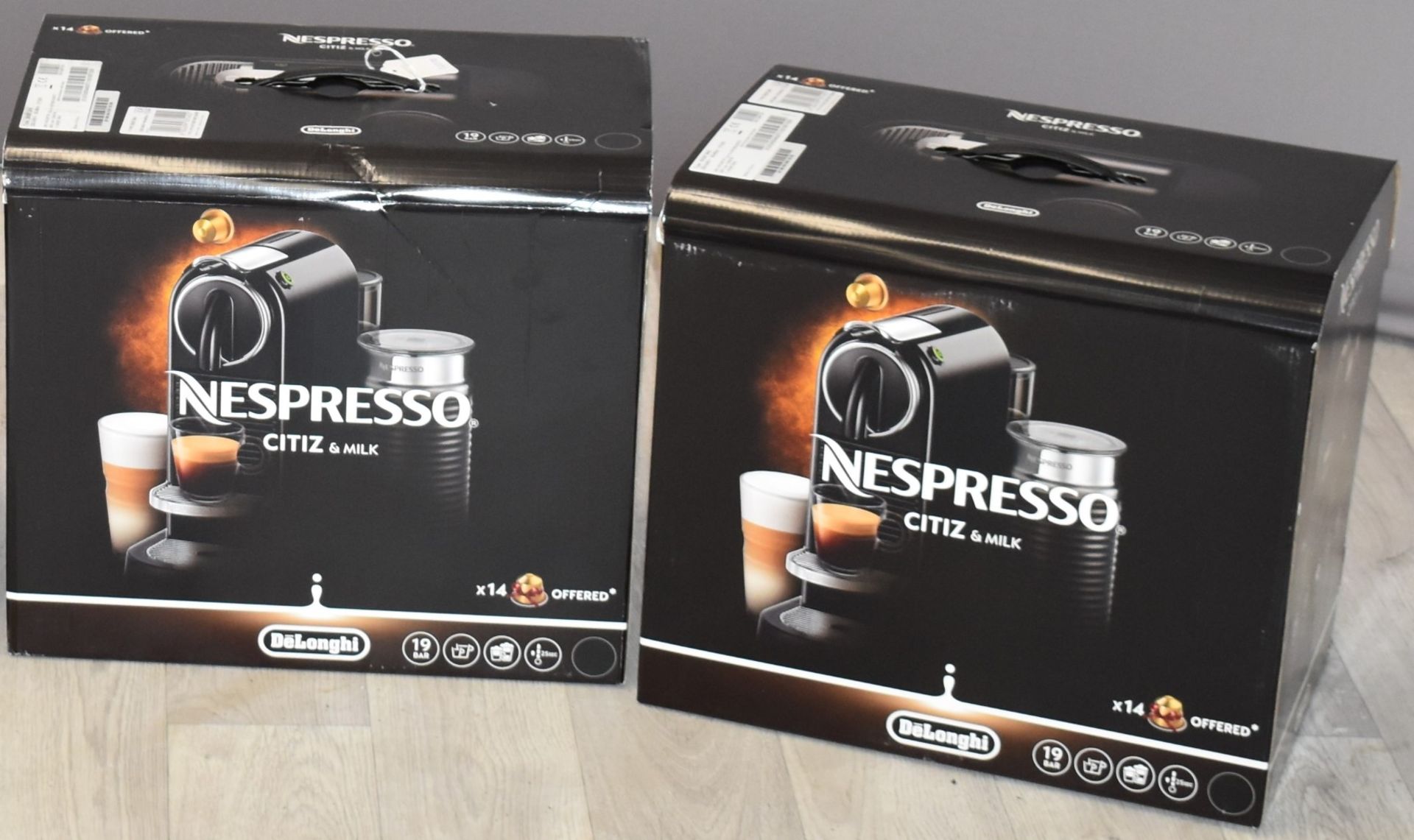 Two Nespresso coffee machines, new in boxes