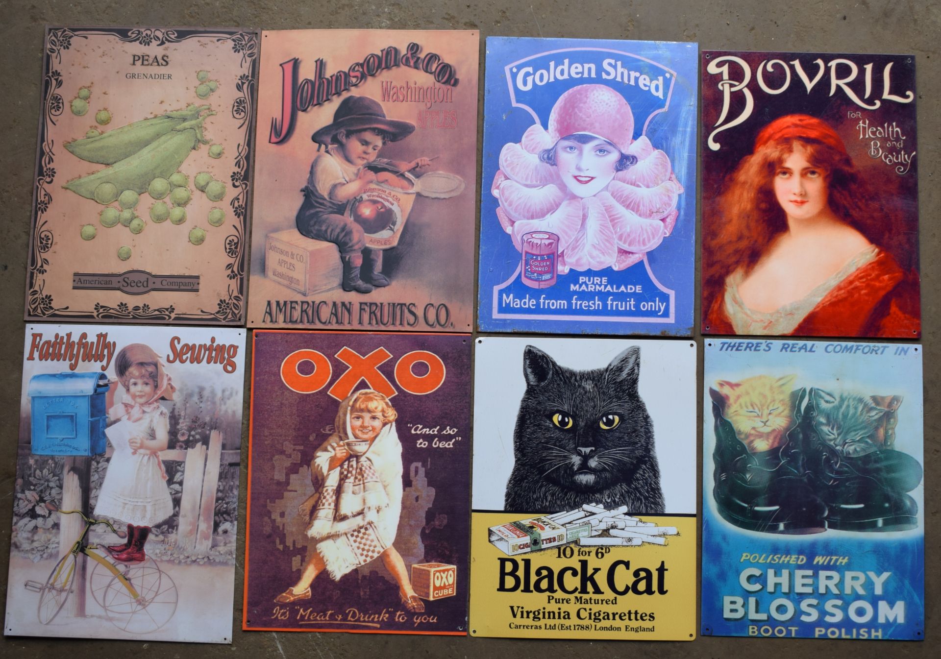 Eight metal advertising signs to include Black Cat, Oxo, Bovril etc, each approximately 40 x 30cm