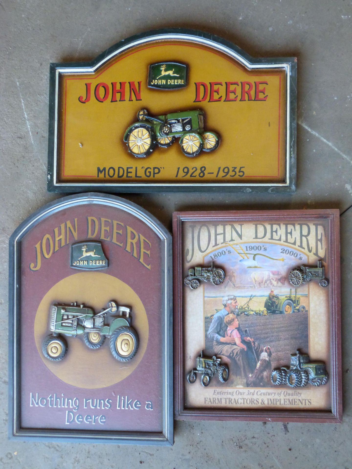 Three John Deere wooden signs, largest 61 x 40cm  PLEASE NOTE this lot is located at and will be