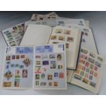 Seven stamp albums and stockbooks of all world stamps, all reigns