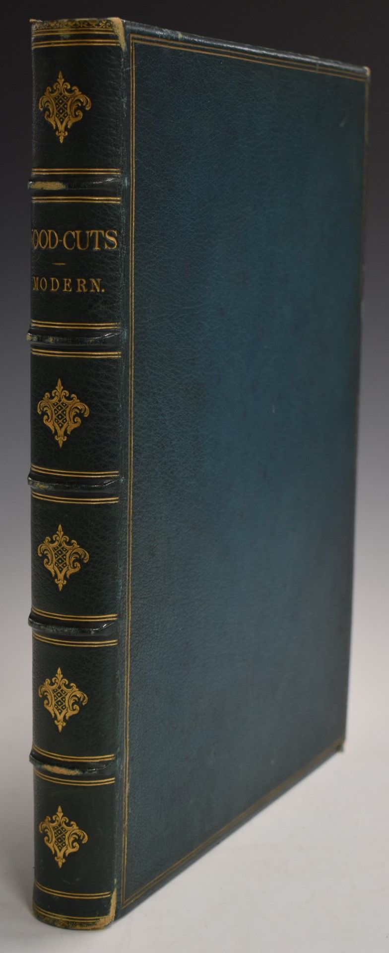 [Album] A large late 19thC volume titled in gilt “Woodcuts Modern” a blank album bound in full