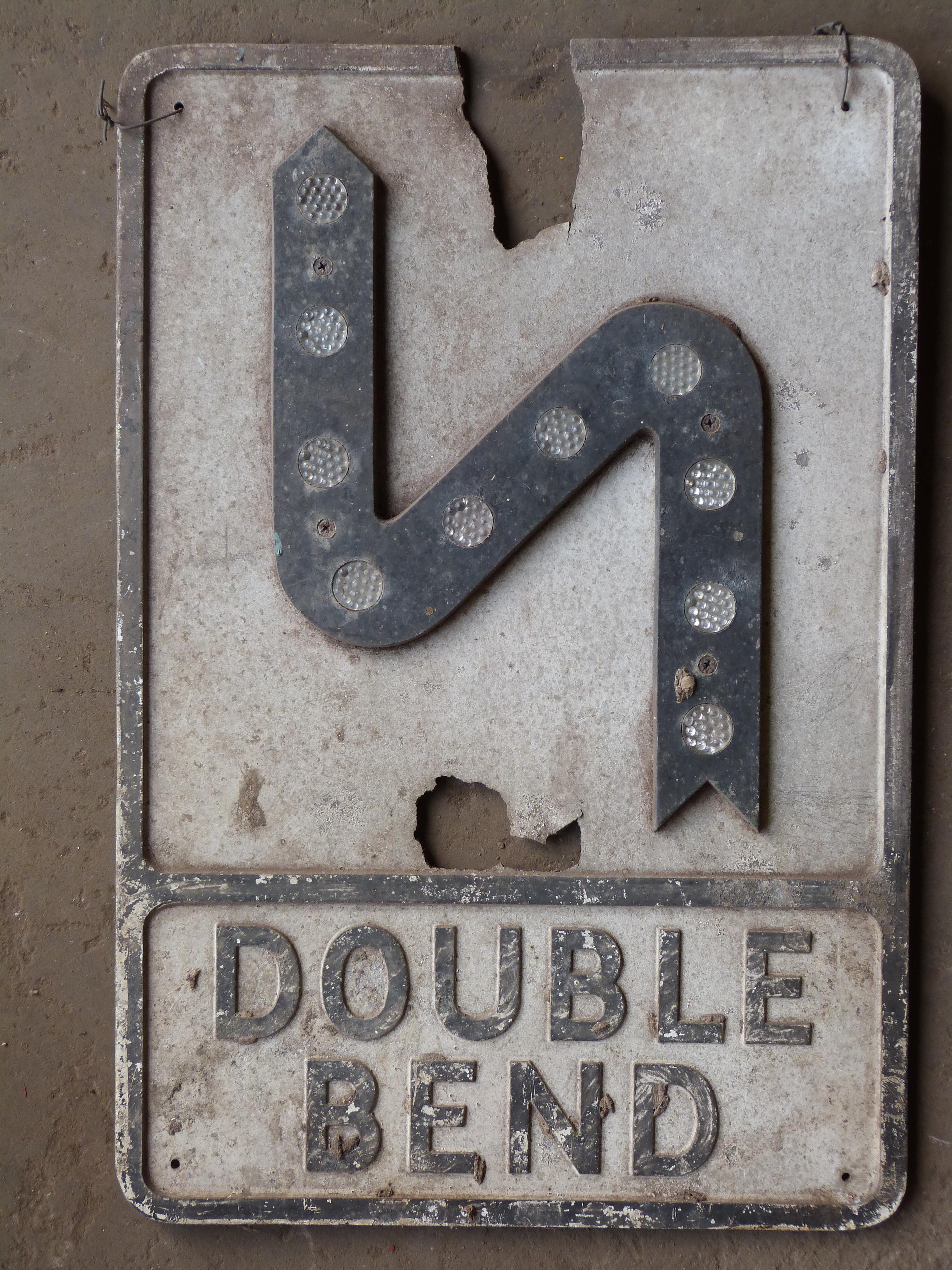 Vintage cast aluminium double bend road warning sign with inbuilt reflectors, 53 x 36cm PLEASE