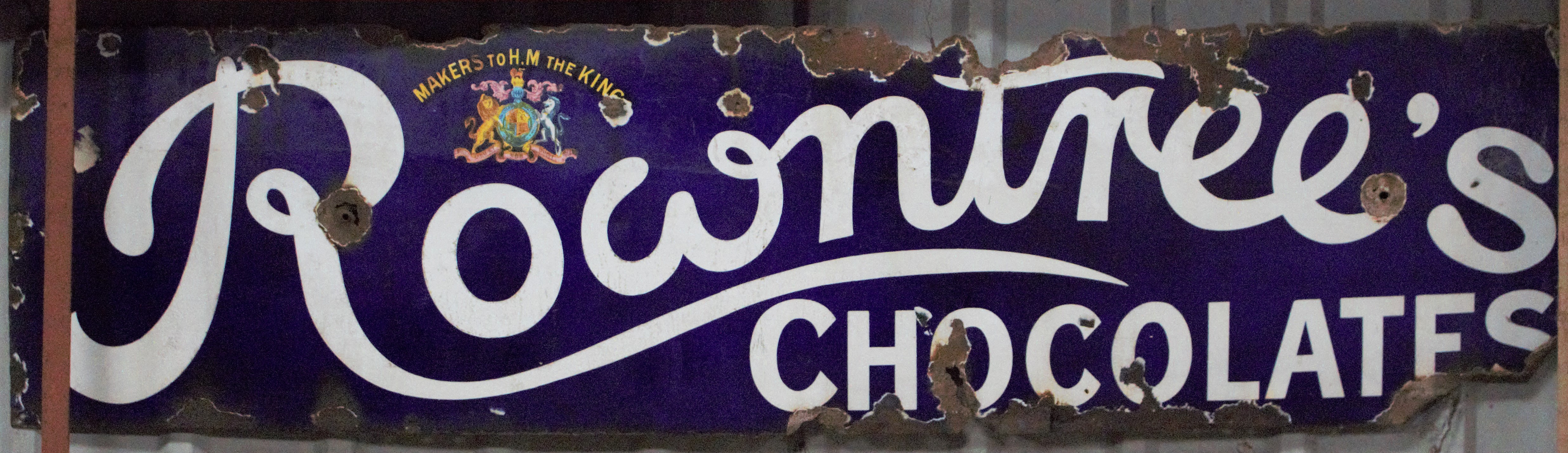 Vintage enamel advertising sign Rowntree's Chocolates, 38 x 155cm PLEASE NOTE this lot is located at