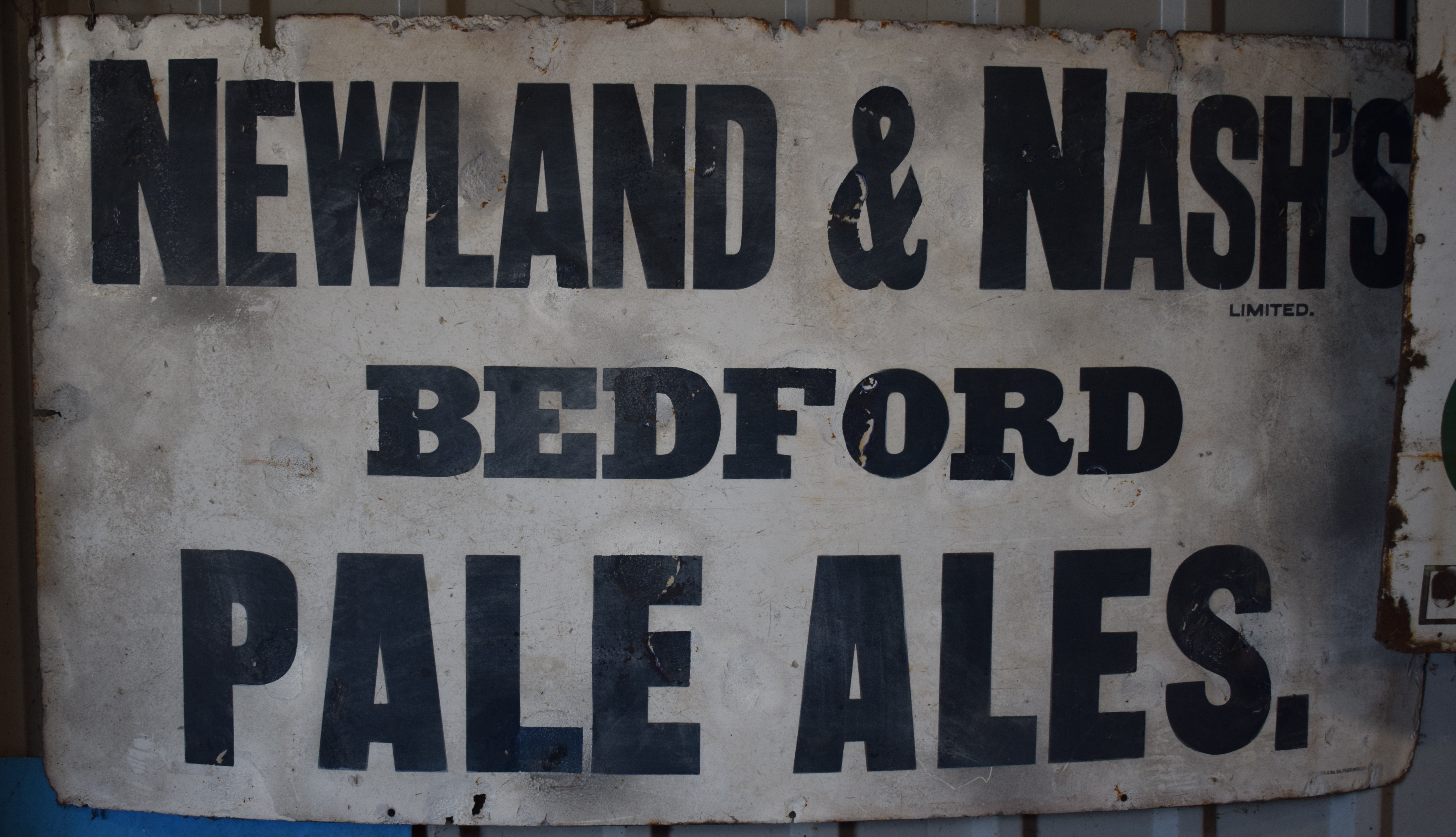 Vintage enamel advertising sign 'Newland & Nash's Bedford Pale Ales', 61 x 114cm PLEASE NOTE this