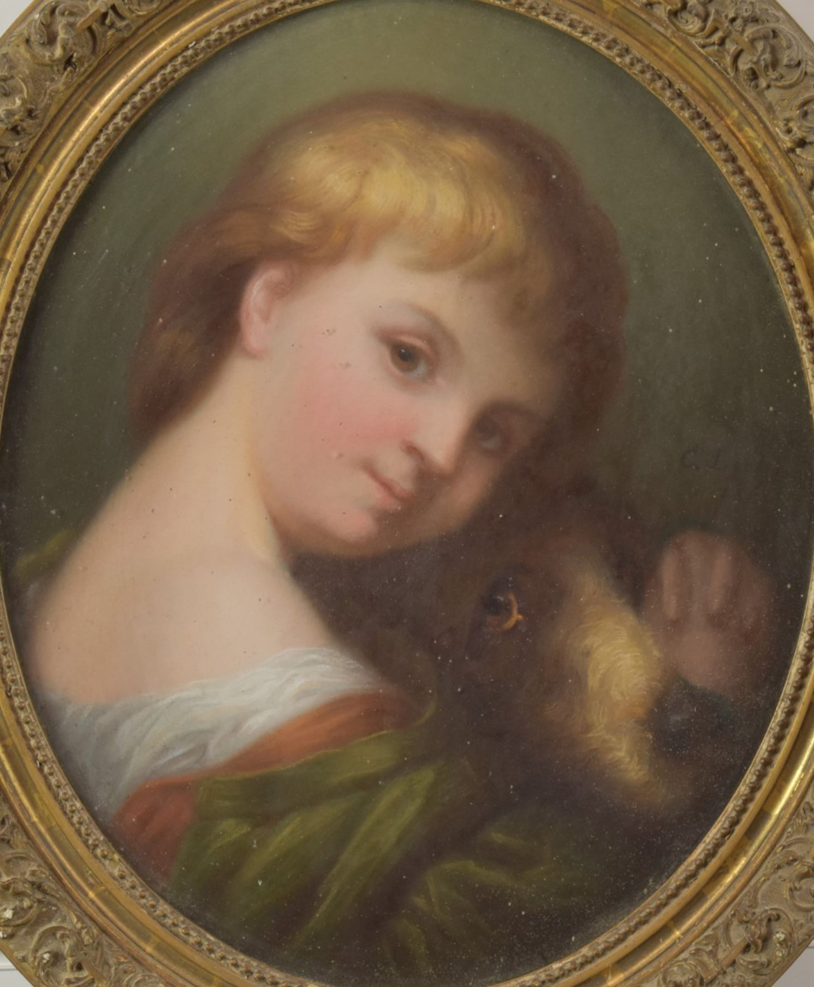 C Lockson Victorian pastel of a boy with dog, signed and dated 1866 to right, maximum diameter 45cm,