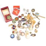 A collection of enamel lapel badges largely relating to bowls clubs, together with cufflinks,