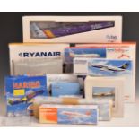 Eighteen 1:100 1:200 and 1:400 scale diecast and plastic model aircraft, all budget carrier liveries