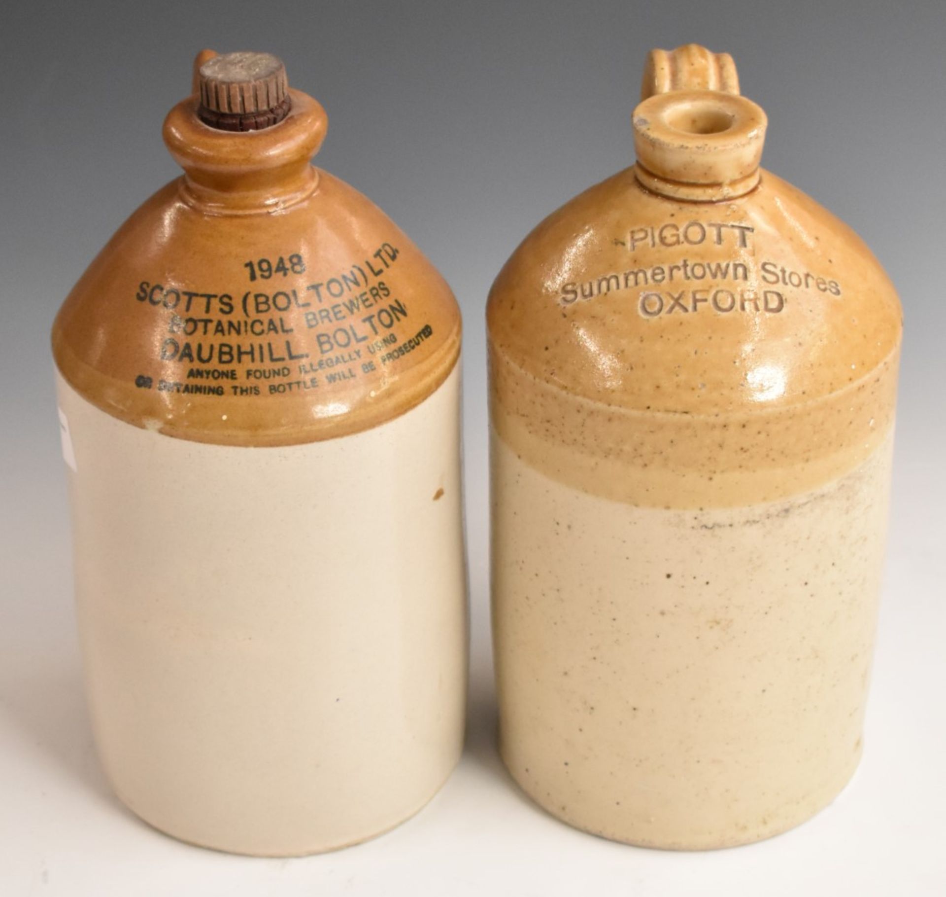 Two stoneware flagons for Pigott Summertown Stores, Oxford and Scotts Botanical Brewers, Bolton,