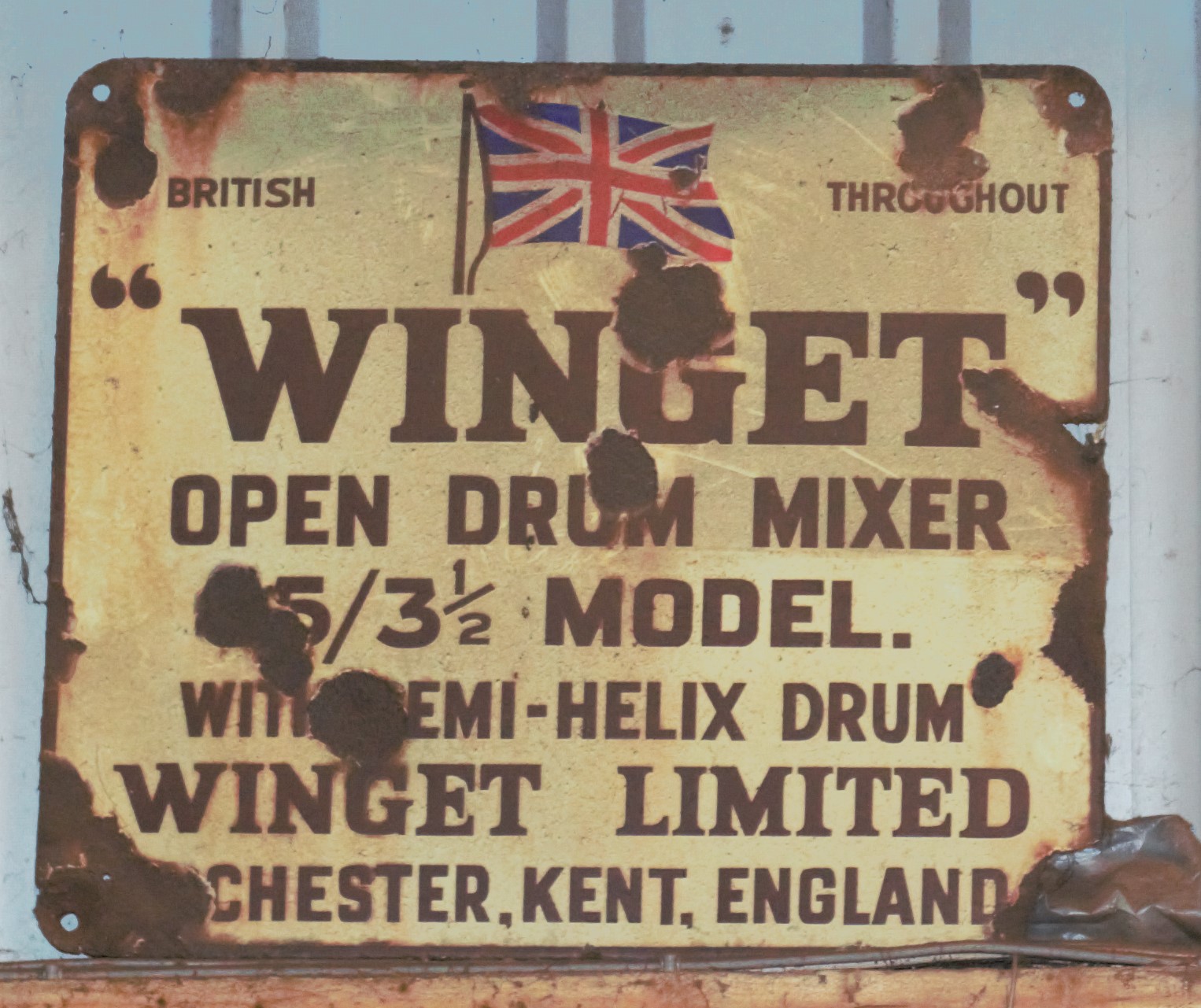 Vintage enamel advertising sign 'Winget open drum mixer', 42 x 48cm  PLEASE NOTE this lot is located