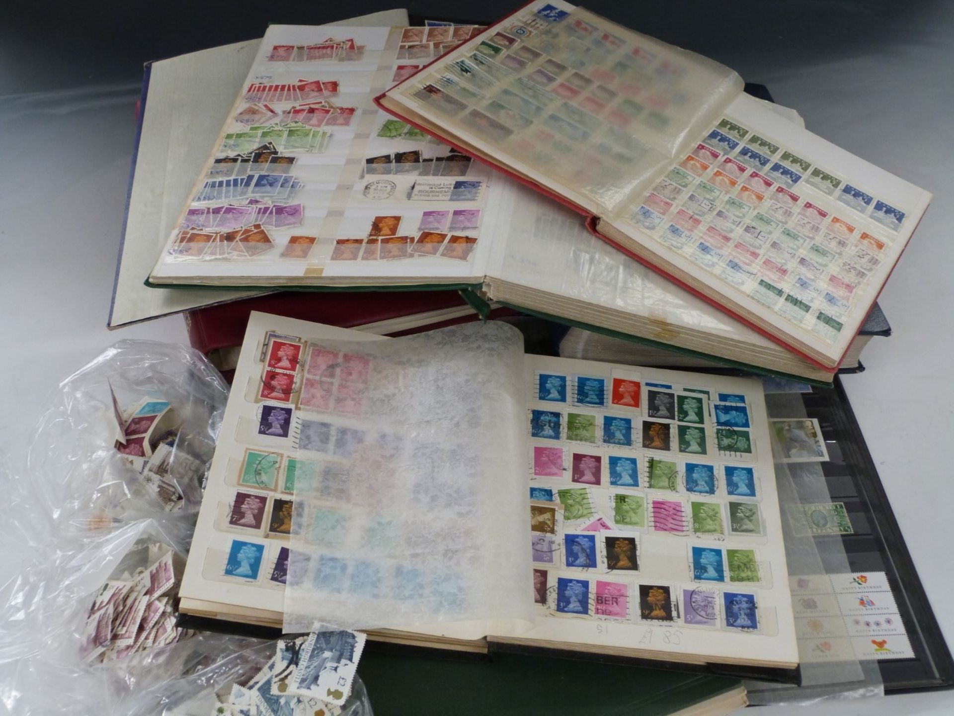 A large quantity of stamp albums and stockbooks, mostly GB, some blocks, gutter pairs, traffic