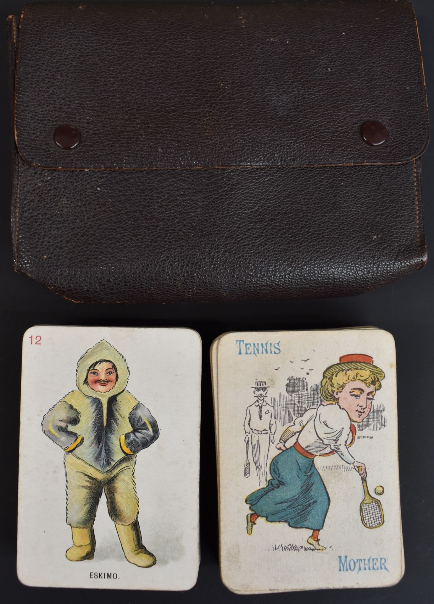 De La Rue Golly card game together with an Old Maid Happy Families sports playing card game