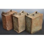 Three vintage 2 gallon petrol cans comprising Shell, Esso and a War Department example dated 1942