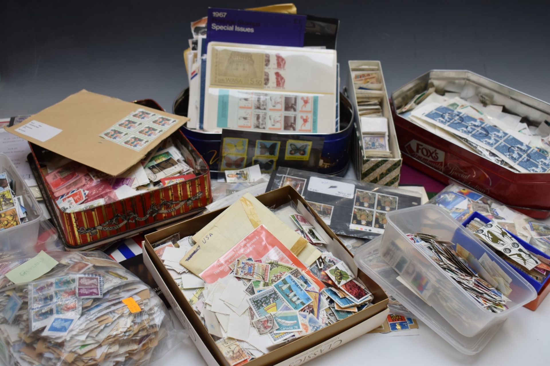 A large collection of stamps including all world presentation packs, mint and unused, first day