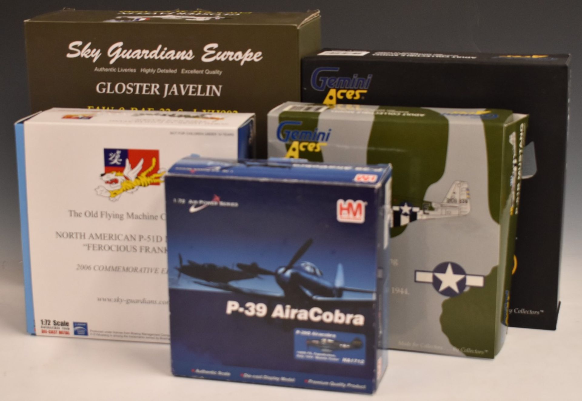 Five 1:72 scale diecast model aeroplanes including Sky Guardians Europe Gloster Javelin,