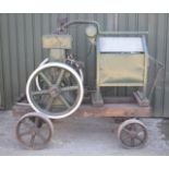 Bamford 6hp diesel engine on steerable four wheel trolley with screen type cooling system fed by a