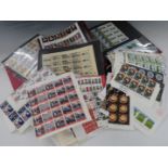 A large quantity of GB QEII mint commemorative stamps comprising mainly corner blocks of either 6 or