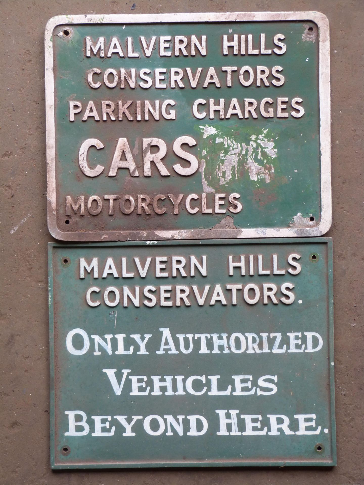 Two cast aluminium Malvern Hills Conservators signs, 30 x 38cm  PLEASE NOTE this lot is located at